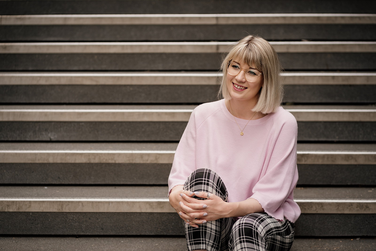 Hattie woman poses for branding headshot in nottingham city centre
