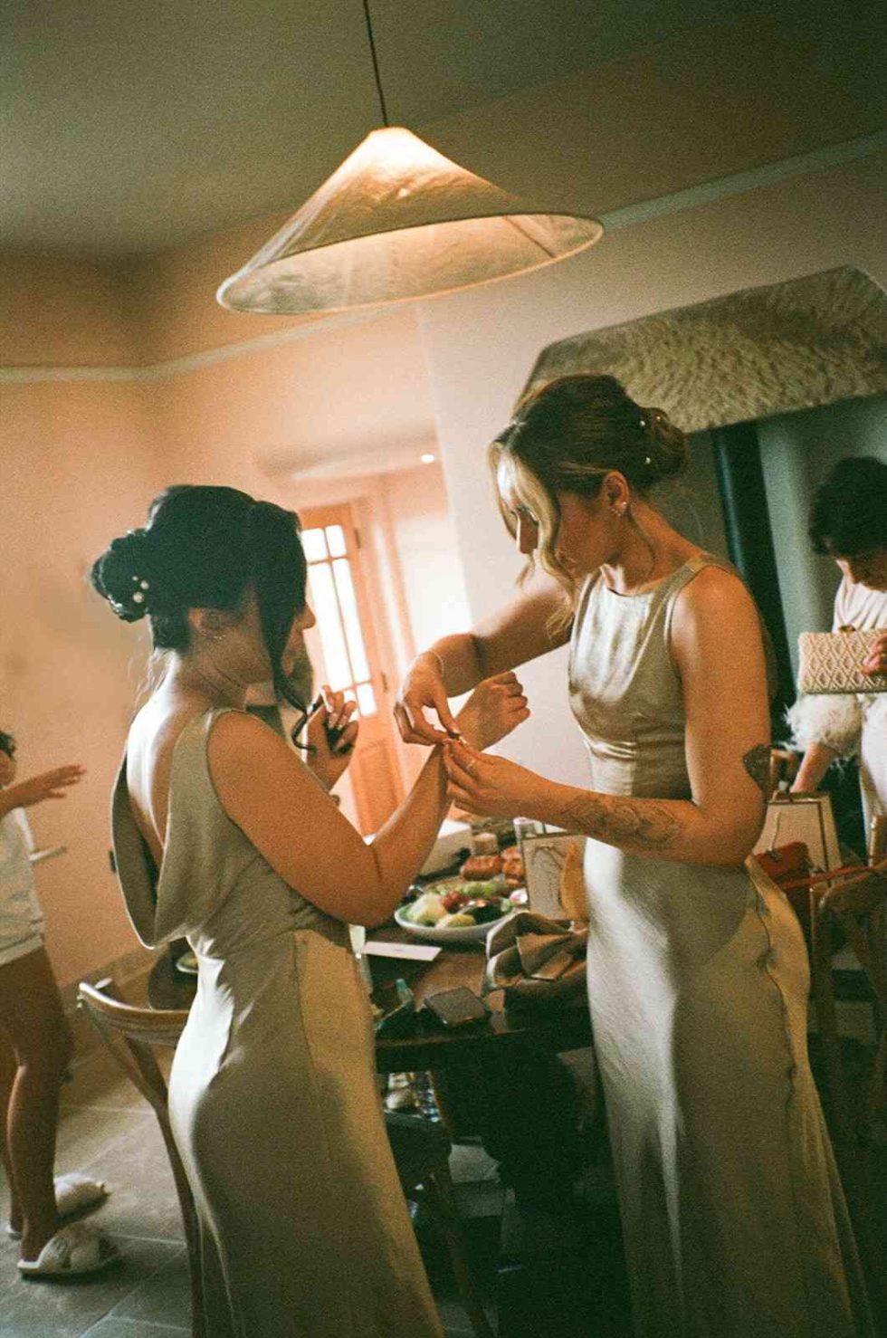 bridesmaids getting ready at grangefields barn wedding captured on 35mm film
