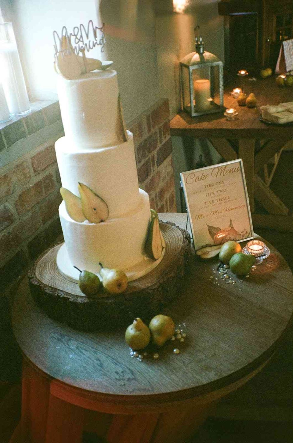three tier wedding cake with pears at grangefields barn wedding
