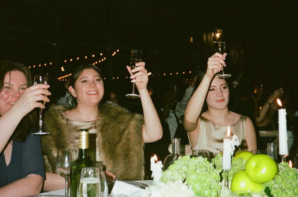 guests cheers captured on 35mm film at grangefields barn wedding