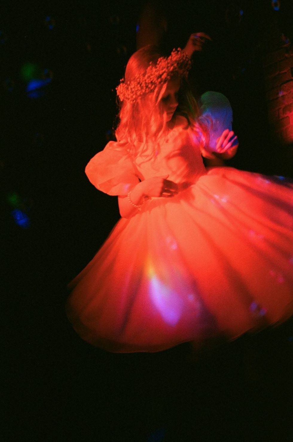 flower girl dancing at grangefields barn wedding on analogue film
