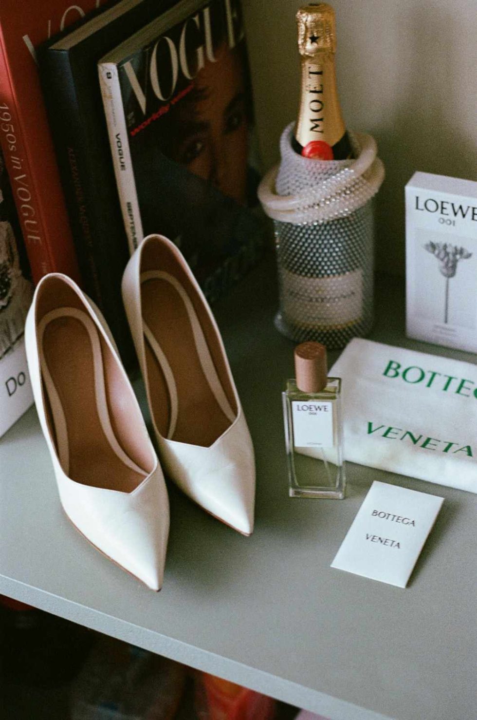 bridal details with loewe perfume captured on 35mm film